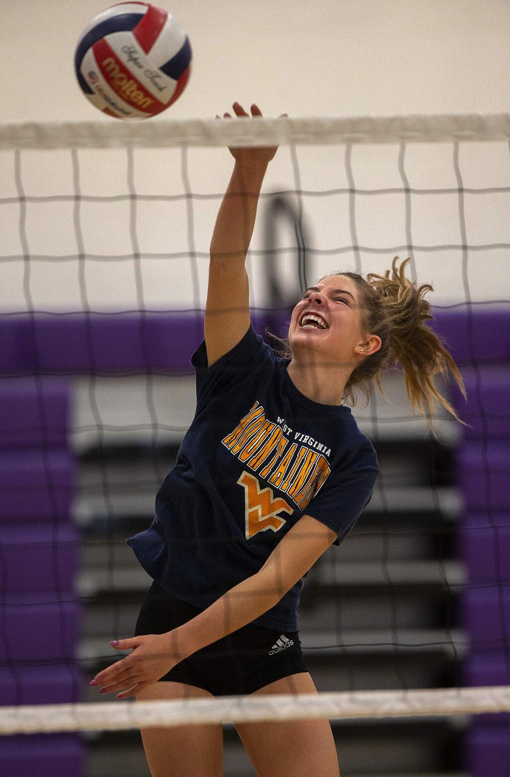 Petaluma High's Anna Hospodar spikes the ball during practice on Tuesday. Petaluma plays No. 1-ranked Branson Wednesday in the semifinals of the Division 3 NCS volleyball tournament. (John Burgess / The Press Democrat)