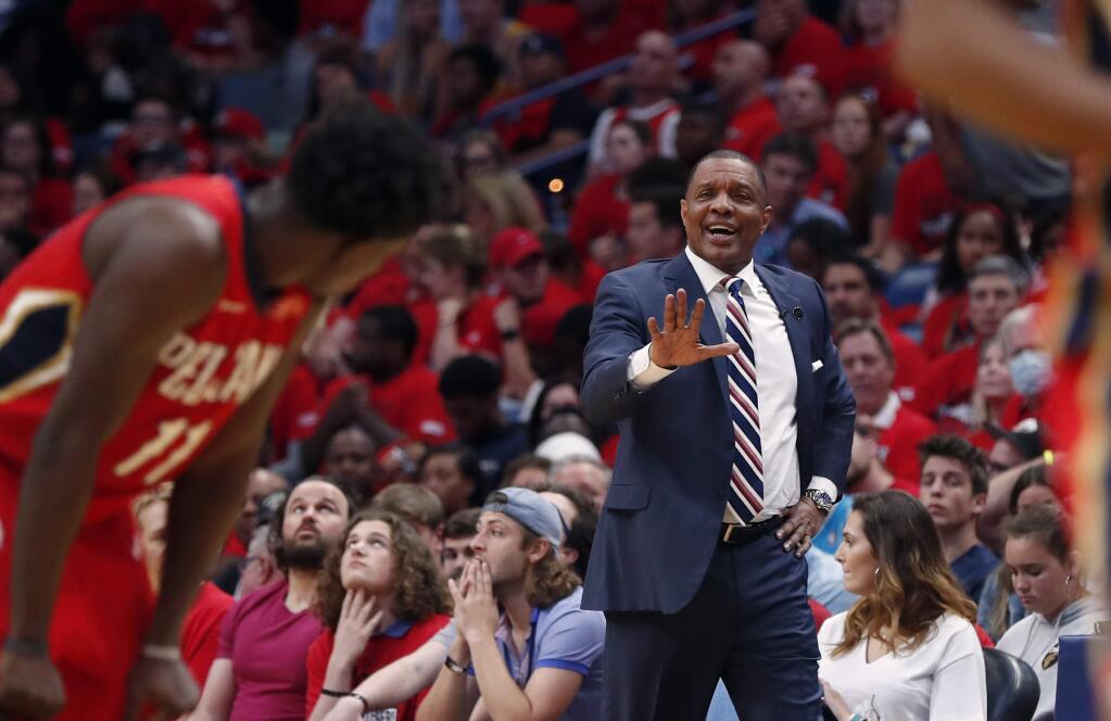 New Orleans Pelicans head coach Alvin Gentry calls from the bench in the second half of Game 4 of a second-round NBA basketball playoff series against the Golden State Warriors in New Orleans, Sunday, May 6, 2018. (AP Photo/Gerald Herbert)