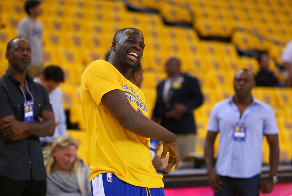 Golden State Warriors forward Draymond Green reacts to missing a three point shot during his shootaround, before the start of Game 5 of the NBA Playoffs Western Conference Finals at Oracle Arena, in Oakland on Wednesday, May 27, 2015. (Christopher Chung/ The Press Democrat)