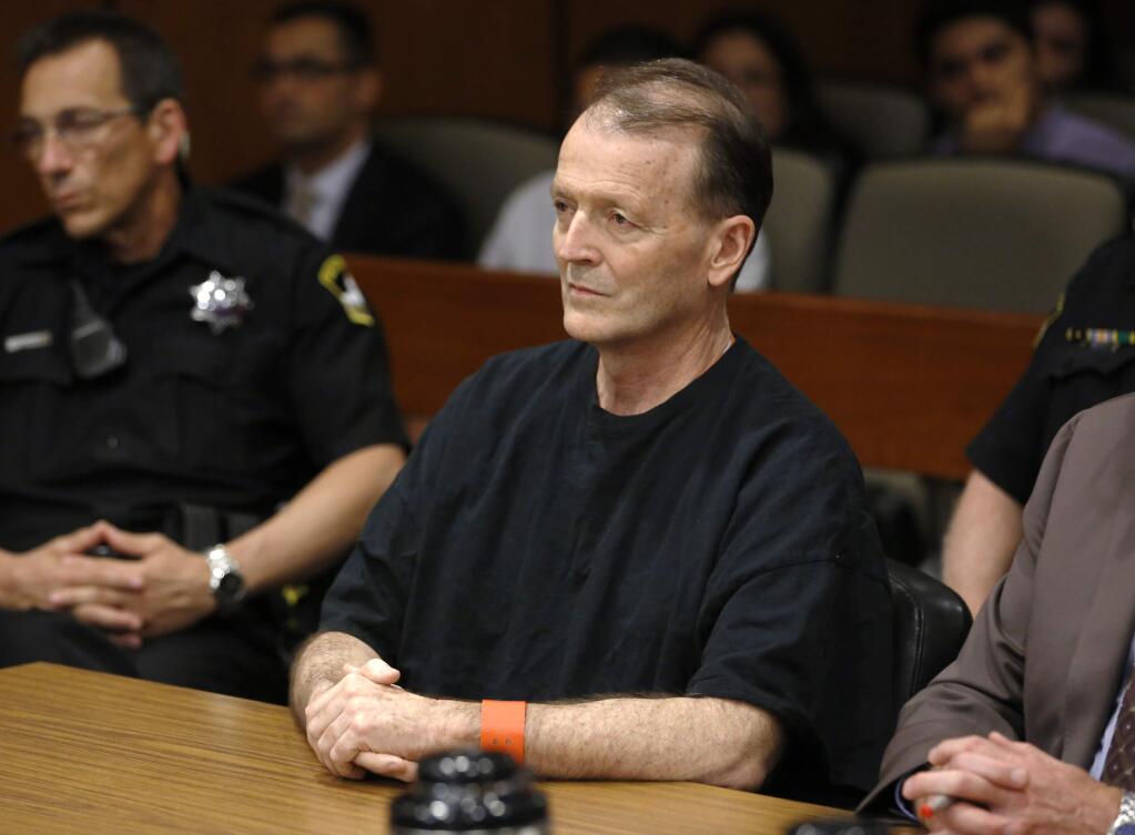 Former California fire battalion chief Orville Fleming listens as Sacramento Superior Court Judge Sharon Lueras sentences him to 15 years to life in prison for the second-degree murder of his girlfriend, Friday, July 31, 2015, in Sacramento,Calif. Fleming, 57, was convicted of the 2014 slaying of 26-year-old Sarah June Douglas in their south Sacramento home.(AP Photo/Rich Pedroncelli)
