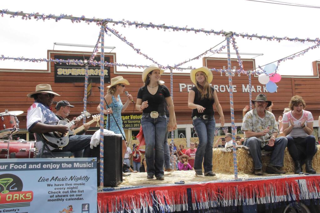 The Twin Oaks Roadhouse Tavern float getting down with some Country Music. The 39th Annual Penngrove Celebration Parade was held on July 5 2015 in Penngrove CA. (Jim Johnson/For the Argus-Courier)