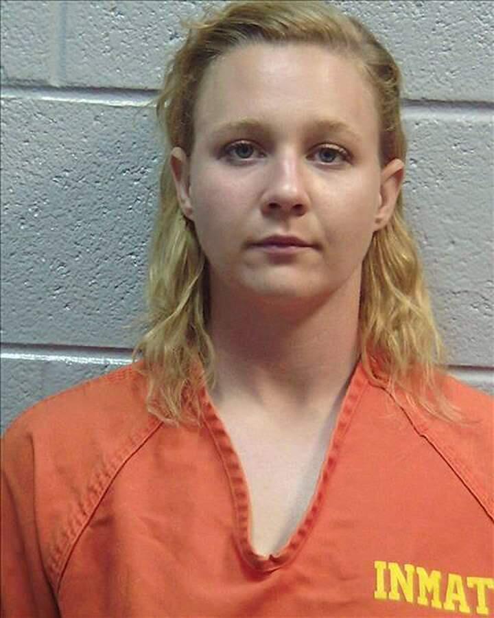 This June 2017 photo released by the Lincoln County (Ga.) Sheriff's Office, shows Reality Winner. Winner, is being held for federal authorities at the Lincoln County, Ga., jail. Winner charged with leaking U.S. government secrets to a reporter poses no flight risk if she's released from pre-trial confinement, her parents said Wednesday, June 7, 2017, though they fear prosecutors will seek to use the case to send a tough message from the Trump administration. (Lincoln County (Ga.) Sheriff's Office via AP)