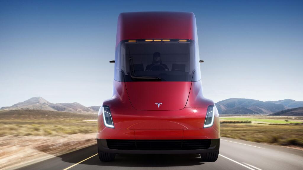 This photo provided by Tesla shows the front of the new electric semitractor-trailer unveiled on Thursday, Nov. 16, 2017. The move fits with Tesla CEO Elon Musk's stated goal for the company of accelerating the shift to sustainable transportation. (Tesla via AP)