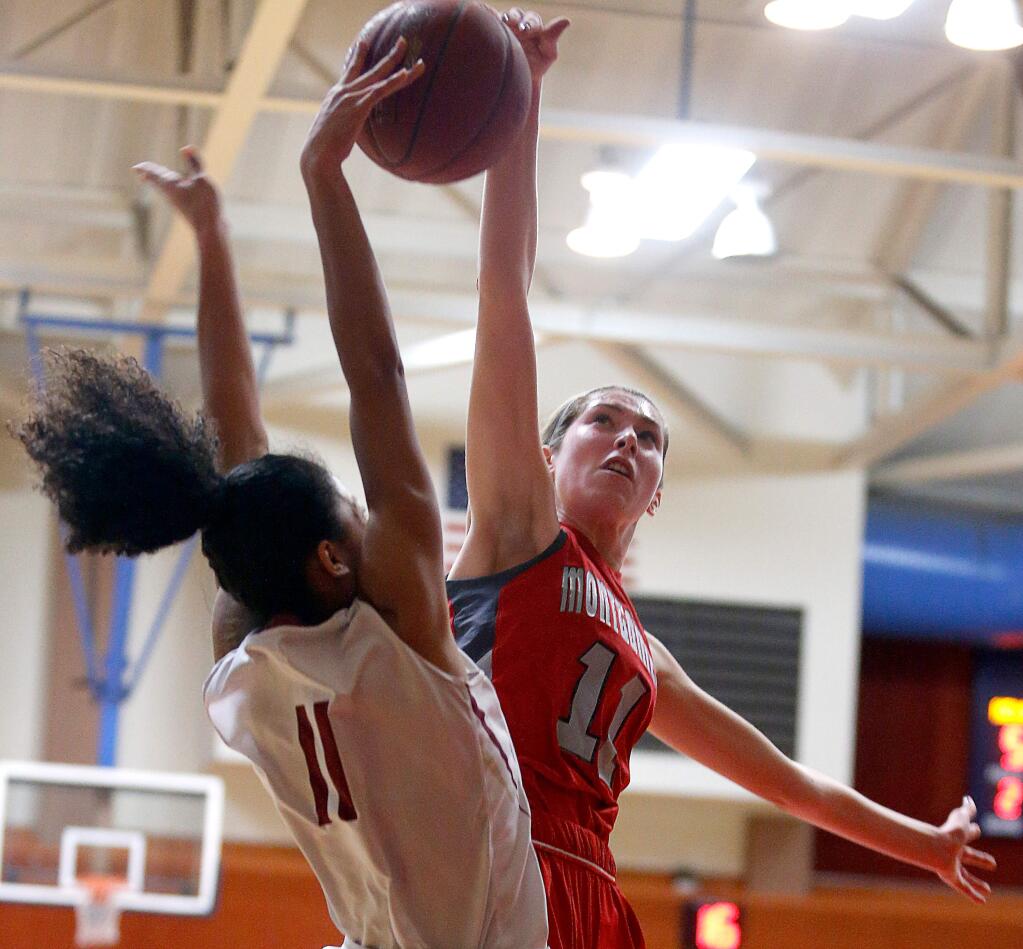 Montgomery's Ashleigh Barr, right, shown here playing for Montgomery High in 2018, scored 19 points, had eight rebounds and three blocks for the Santa Rosa Junior College women’s team in a playoff loss Thursday night. (Alvin Jornada / The Press Democrat)