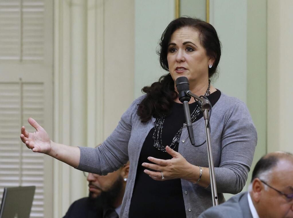 FILE - In this May 29, 2019 file photo, Assemblywoman Lorena Gonzalez, D-San Diego speaks during the Assembly session in Sacramento, Calif. Gov. Gavin Newsom signed Gonzalez's bill, AB273, that now makes it illegal to trap animals in California for recreation or to sell their fur, Wednesday, Sept. 4, 2019. (AP Photo/Rich Pedroncelli, File)