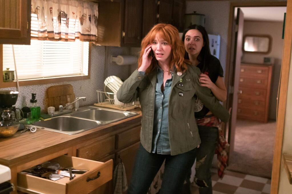 Aviron PicturesChristina Hendricks, left, as Cindy and Bailee Madison as Kinsey in the horror sequel 'The Strangers: Prey at Night.'