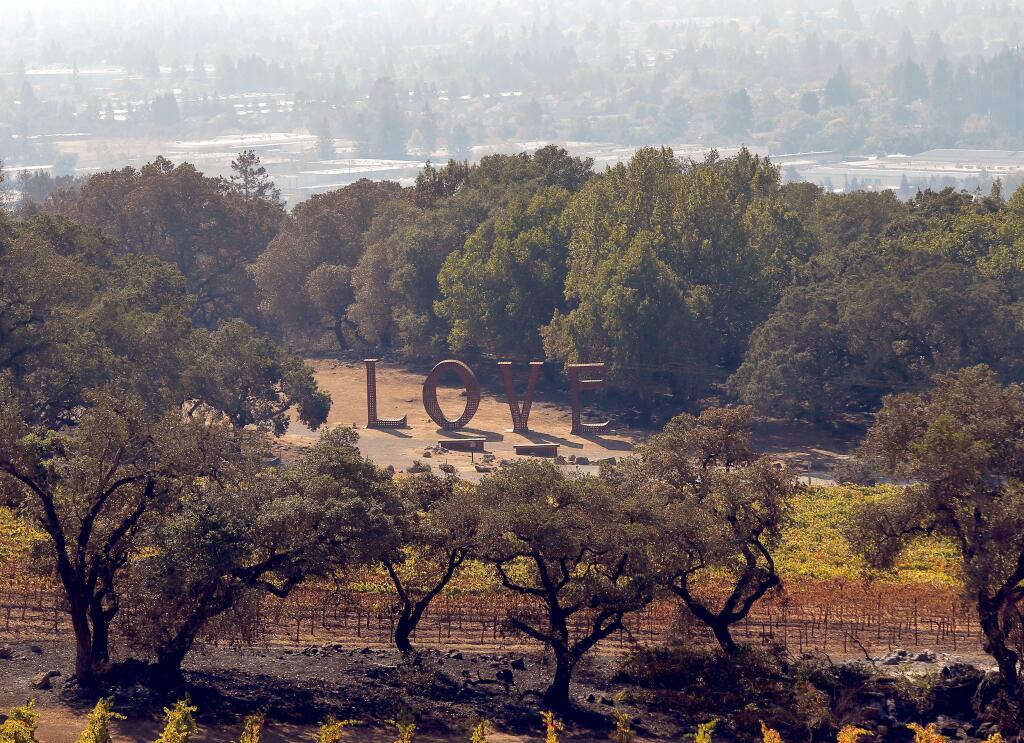 The two-story tall, metal Love sculpture still stands at Paradise Ridge Winery, in Santa Rosa, California, on Thursday, Oct. 12, 2017. The winery's tasting room, wine production facility and some of the surrounding vineyards and gardens were destroyed by the Tubbs fire three days earlier. (Alvin Jornada/The The Press Democrat file)
