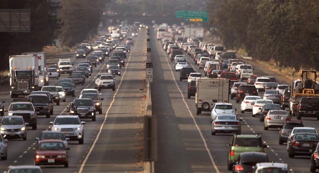 Highway 101 is packed with afternoon commuters between Todd Road and Hearn Avenue, Thursday, August 23, 2018 in Santa Rosa. During the past decade, car trips on the highway have risen 20 percent. (Kent Porter / The Press Democrat) 2018