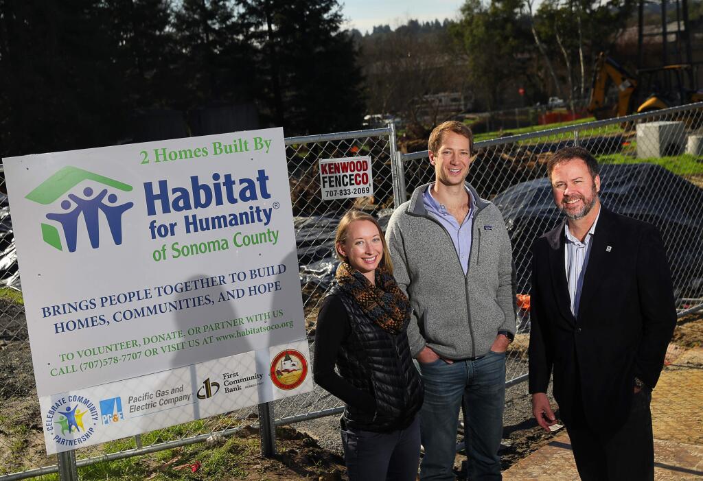 Chelsea Boss, general manager of Senses Wines, left, and Chris Strieter, founder of Senses Wines, are spearheading the Rebuild Wine Country effort, and have partnered with John Kennedy, chairman of Habitat for Humanity of Sonoma County, to raise money to pay for materials to build new houses.(Christopher Chung/ The Press Democrat)