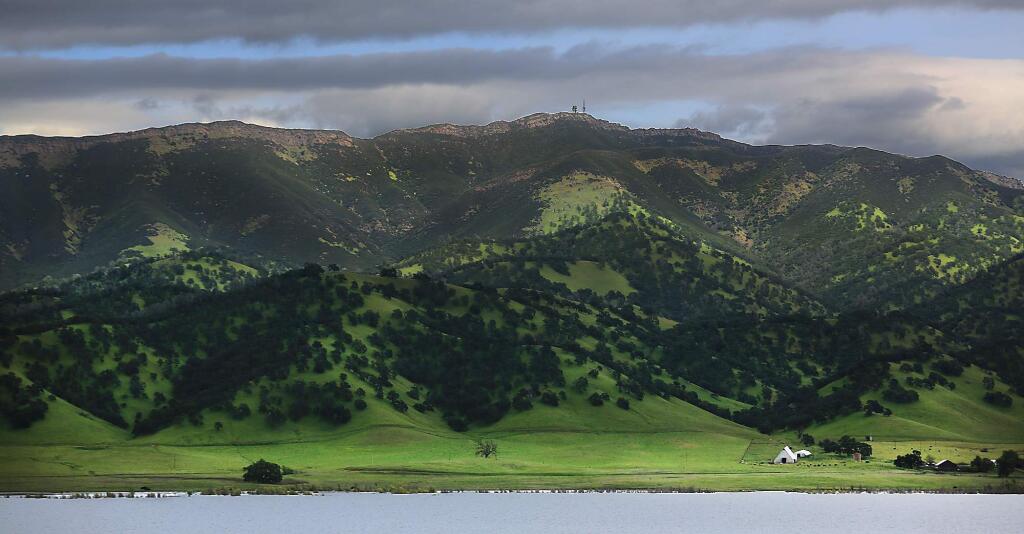 A ranch is dwarfed by Berryessa Peak on Blue Ridge as part Berryessa Snow Mountain National Monument, Tuesday April 25, 2017 in Napa County. (Kent Porter / The Press Democrat) 2017