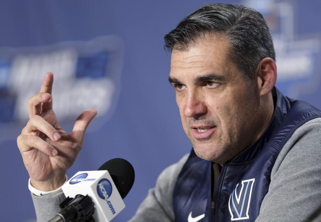 Villanova coach Jay Wright speaks during a news conference in Buffalo, N.Y., Wednesday, March 15, 2017. Villanova, a No. 1 seed, opens the NCAA men's basketball tournament in the first round against Mount St. Mary's on Thursday. (Michael P. King/Wisconsin State Journal via AP)