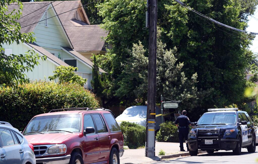 Santa Rosa Police investigate the scene of a double homicide along Slater Street in Santa Rosa on Monday, June 19, 2017. (CHRISTOPHER CHUNG/ PD)
