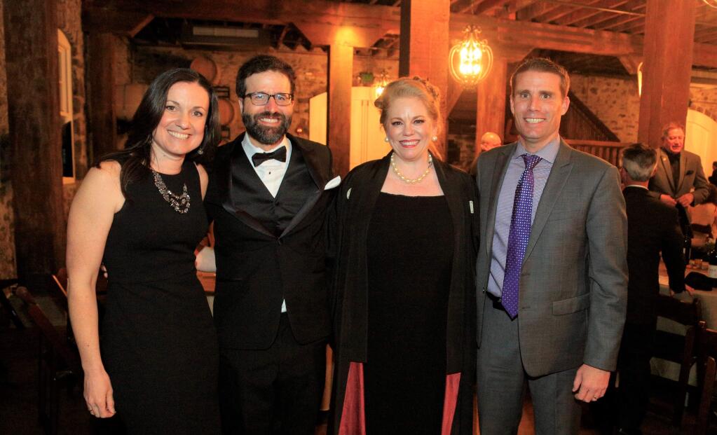 From left, Erika McGuire, Ryan Hecht, Kathryn Hecht and State Senator Mike McGuire posed for a photo at the Academy Awards viewing party 'Red Carpet Evening,' an event raising funds for the Alexander Valley Film Society at Trione Winery in Geyserville on Sunday, March 4, 2018. (Photo Will Bucquoy/For the Press Democrat)