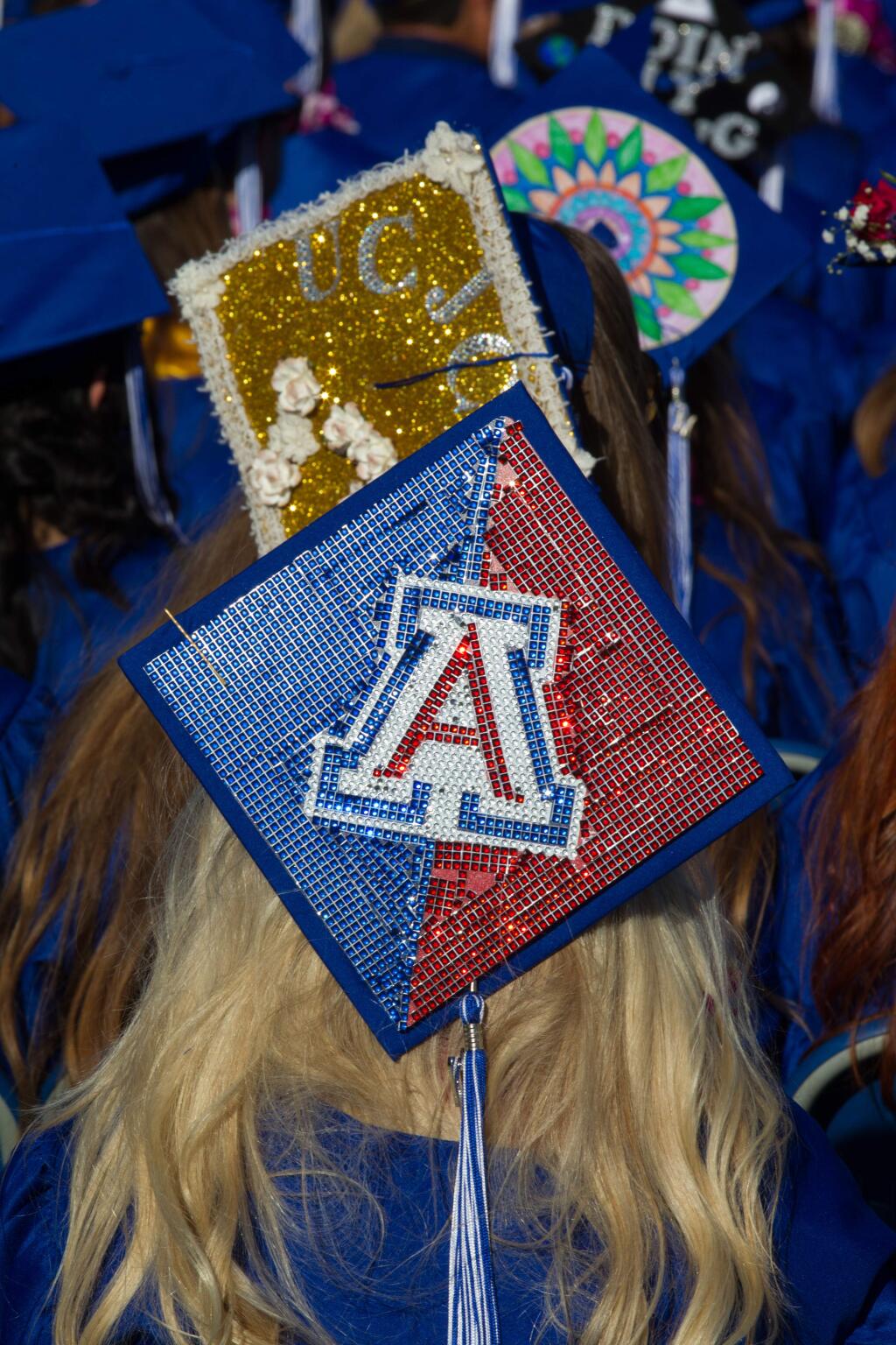 Colorful caps worn at the class of 2017 commencement ceremony for Analy High School in Sebastopol, Calif., on Friday, June 2, 2017. (Photo by Darryl Bush / For The Press Democrat)