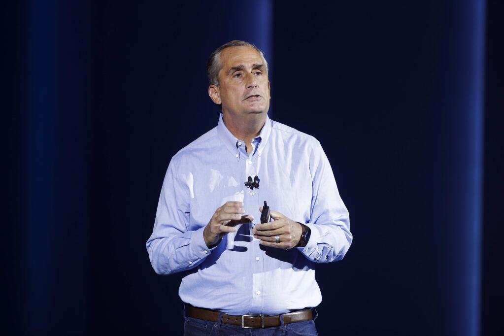 FILE- In this Jan. 8, 2018, file photo, Intel CEO Brian Krzanich delivers a keynote speech at CES International in Las Vegas. Krzanich is resigning after the company learned of a consensual relationship that he had with an employee. Intel said Thursday, June 21, that the relationship was in violation of the company's non-fraternization policy, which applies to all managers.(AP Photo/Jae C. Hong, File)