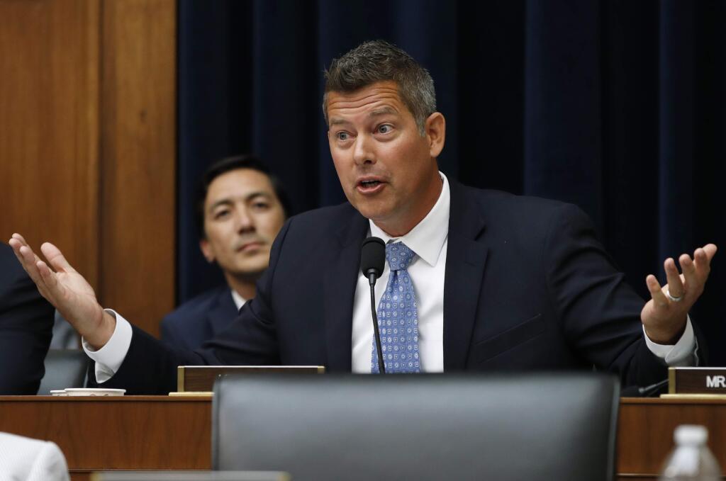 Rep. Sean Duffy, R-Wisc., asks a question of Federal Reserve Board Chair Jerome Powell during a House Committee on Financial Services hearing, Wednesday, July 18, 2018, on Capitol Hill in Washington. (AP Photo/Jacquelyn Martin)
