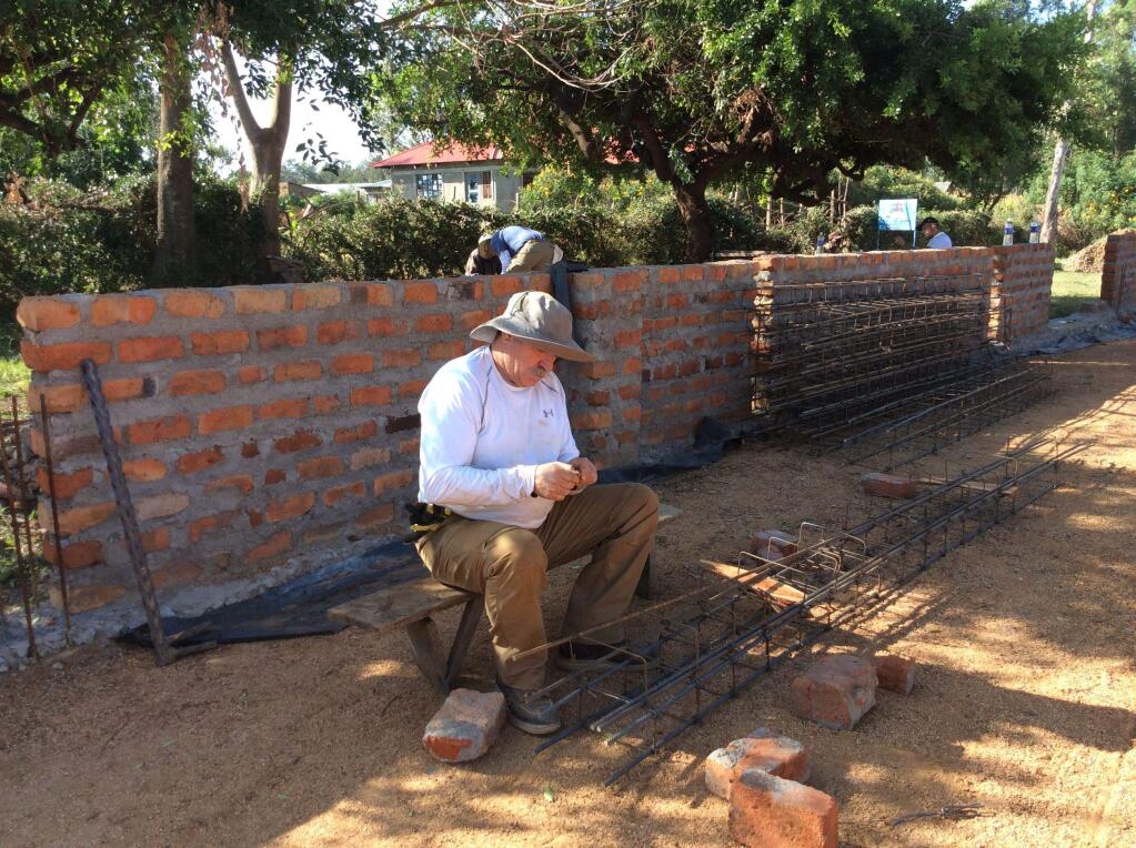 Tim Tillman of Petaluma Calvary Chapel works on a church construction project in Kenya. COURTESY TOM FREITAS