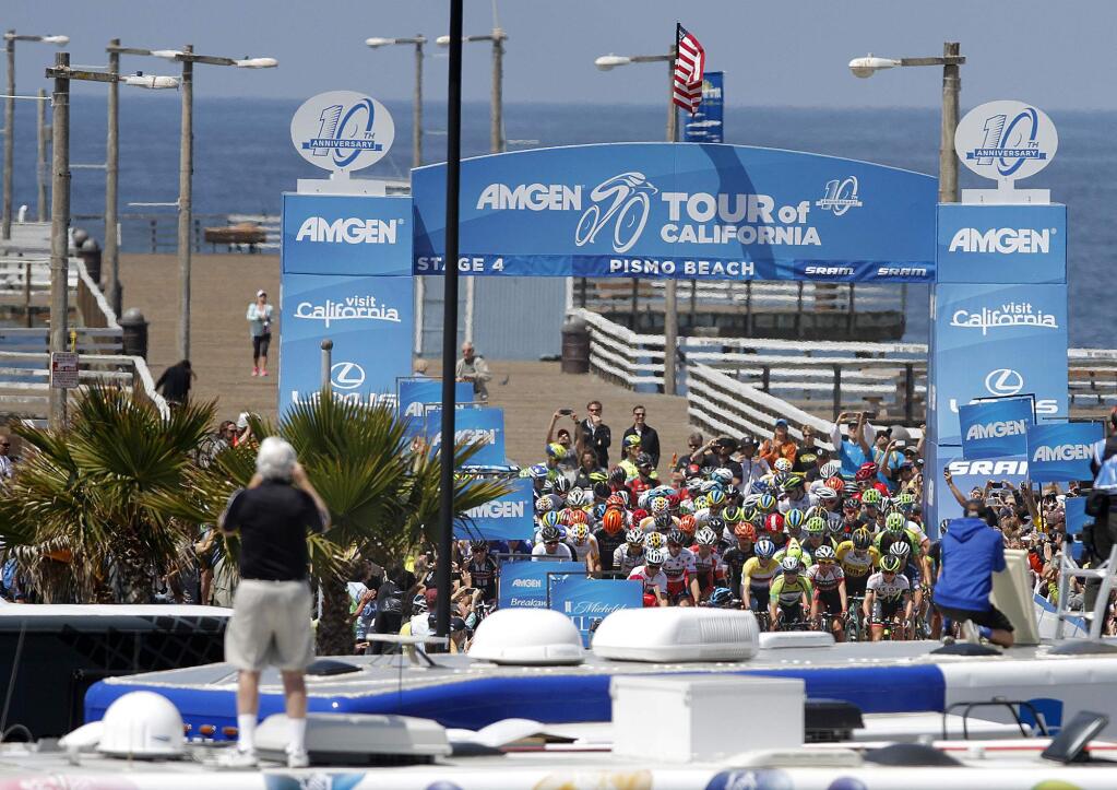 Cyclists begin the fourth stage of the Tour of California cycling race, from Pismo Beach, Calif. to Avila Beach, Calif., Wednesday, May 13, 2015. (Daniel Dreifuss/The Santa Maria Times via AP)