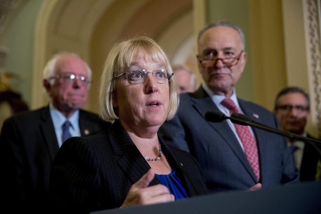 Sen. Patty Murray, D-Wash., accompanied by Sen. Bernie Sanders, I-Vt., left, and Senate Minority Leader Sen. Chuck Schumer of N.Y., right, speaks to reporters on Capitol Hill in Washington, Tuesday, Oct. 17, 2017, after she and Sen. Lamar Alexander, R-Tenn., say they have the 'basic outlines' of a bipartisan deal to resume payments to health insurers that President Donald Trump has blocked. (AP Photo/Andrew Harnik)