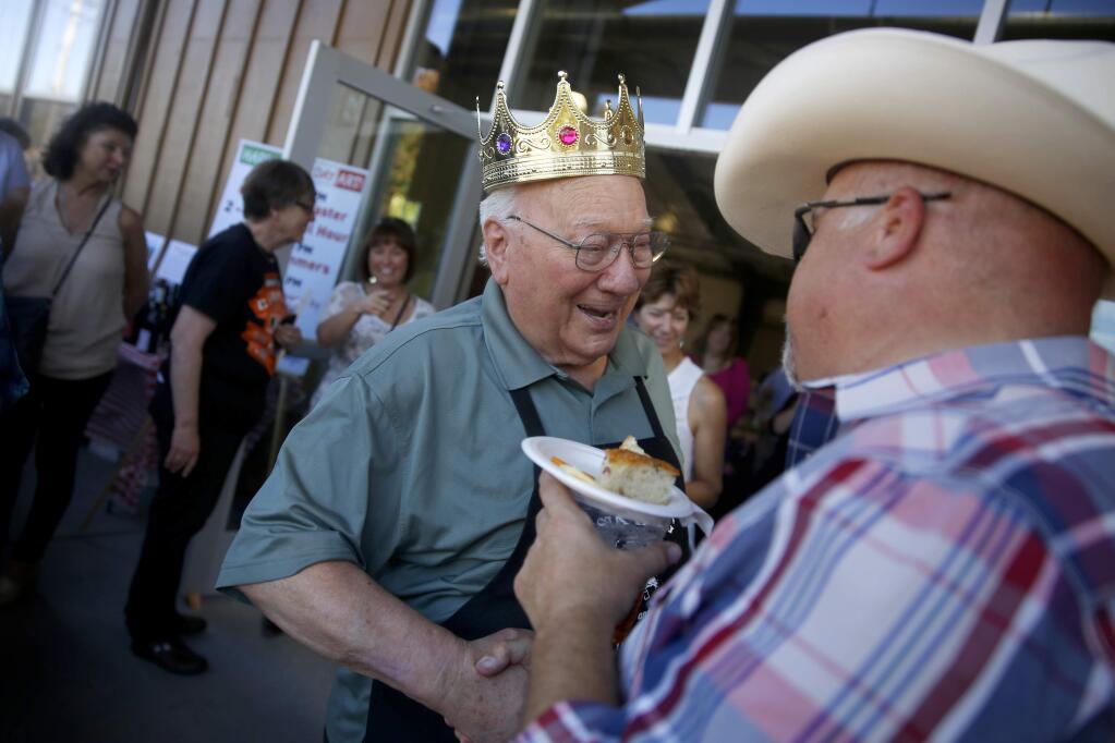 Art Ibleto shakes hands with Jim Bertoli during his 90th birthday celebration at Saralee and Richard's Barn at the Sonoma County Fairgrounds on Sunday, October 9, 2016 in Santa Rosa, California . (BETH SCHLANKER/ The Press Democrat)