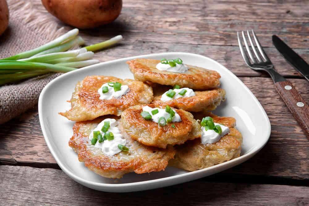 Latkes go great with sour cream and apple sauce.