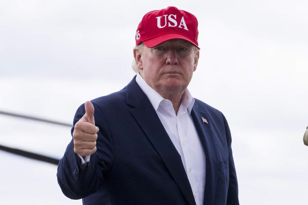 President Donald Trump gives thumbs up before departing Shannon Airport, Friday, June 7, 2019, in Shannon, Ireland. (AP Photo/Alex Brandon)
