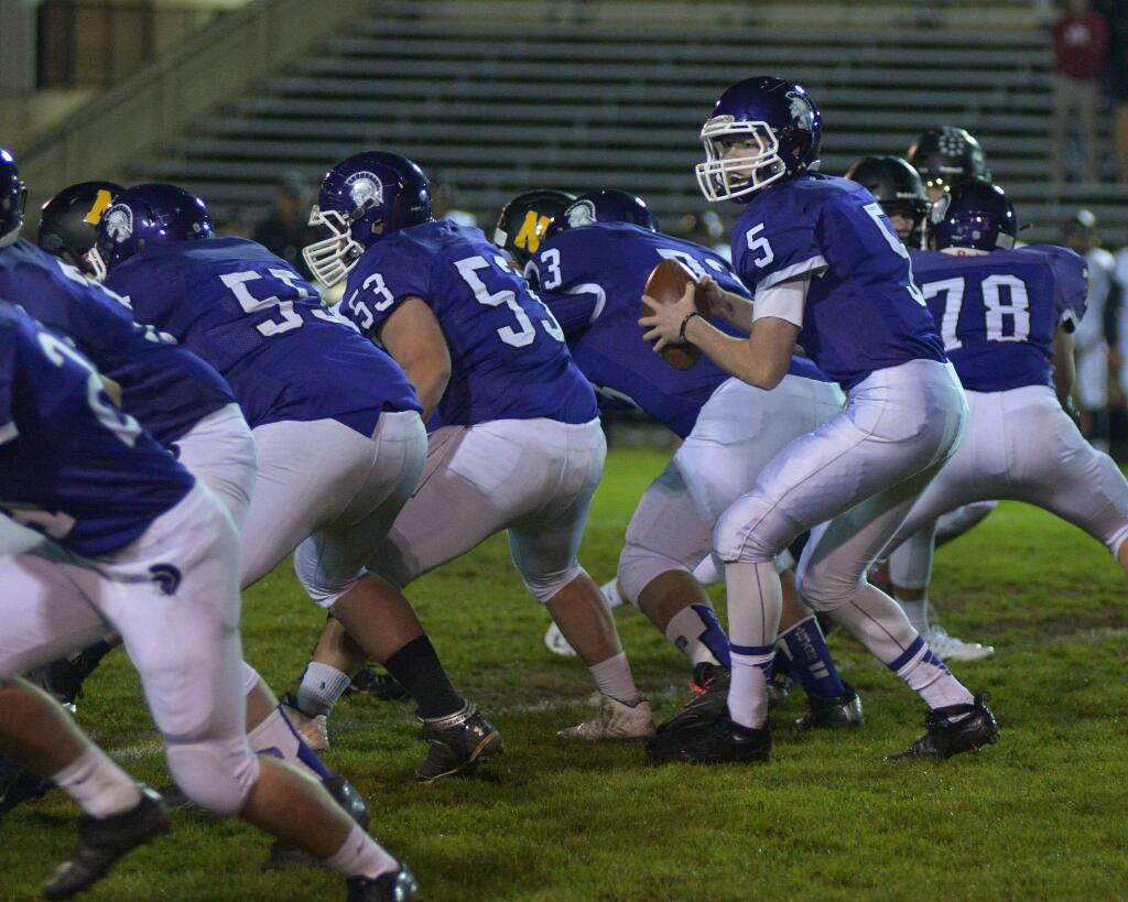 SUMNER FOWLER/FOR THE ARGUS-COURIERQuarterback Brendan White, operating behind an offensive line that includes William O'Neil, Ben Upton (53), Joe Beccera (73) and Travis Plank (72) is a combination that has carried Petaluma to an 8-3 record and into a big NCS game Saturday night at Rancho Cotate.