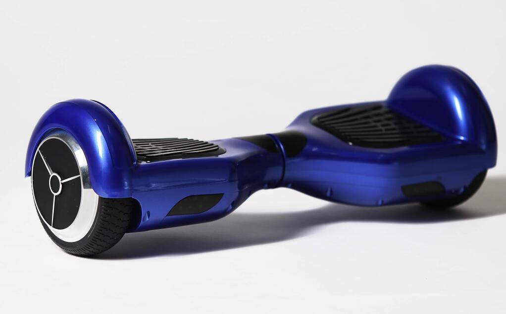'Hoverboard' electric scooters with inferior batteries and plugs have been linked to charging failures and repoted fires. (Christopher Chung/ The Press Democrat)