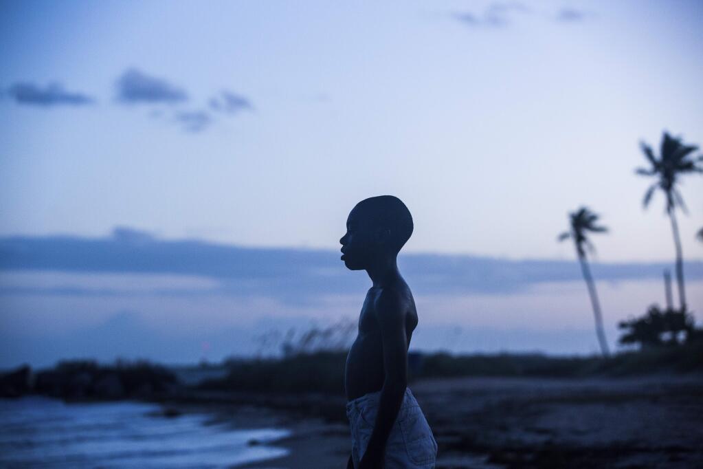 This image released by A24 Films shows Alex Hibbert in a scene from the film, 'Moonlight.' Nominees for the 89th Academy Awards will be announced on Tuesday, Jan. 24, 2017. (David Bornfriend/A24 via AP)