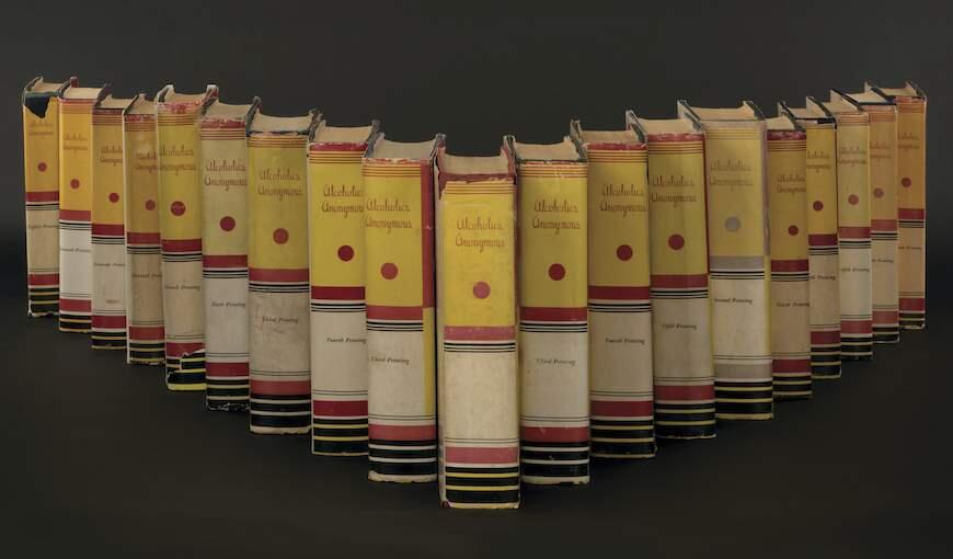 This undated photo provided by Profiles In History shows a collection of 19 first-edition copies of the founding document of Alcoholics Anonymous, known to adherents as the 'Big Book,' that will be auctioned off in Los Angeles next month. (Profiles In History via AP)