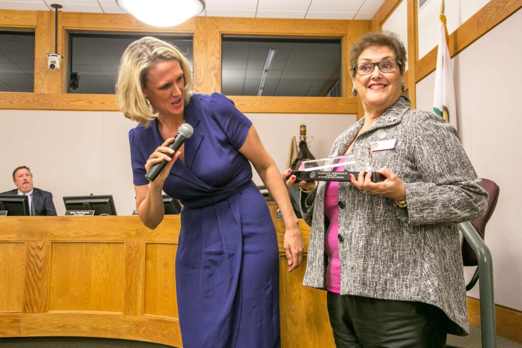 Madolyn Agrimonti (right) is presented with a crystal gavel in recognition of her service as mayor by Amy Harrington at the Sonoma City Council meeting Dec. 10, 2018. (Photo by Julie Vader/special to the Index-Tribune)