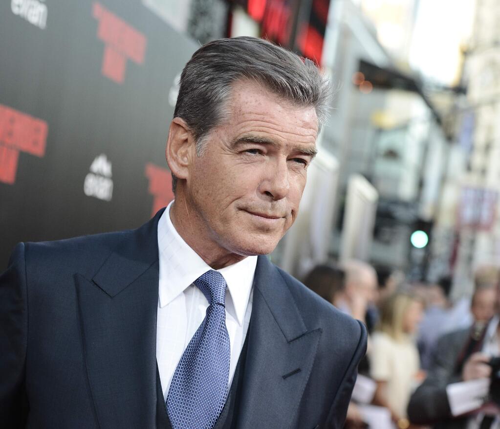 Actor Pierce Brosnan attends the premiere of the feature film 'The November Man' at TCL Chinese Theatre on Wednesday, Aug. 13, 2014 in Los Angeles. (Photo by Dan Steinberg/Invision/AP Images)