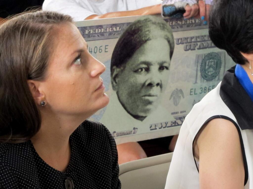 A sign supporting Harriet Tubman for the $20 bill is seen during a meeting last year at the Women's Rights National Historical Park in Seneca Falls, N.Y. (CAROLYN THOMPSON / Associated Press)