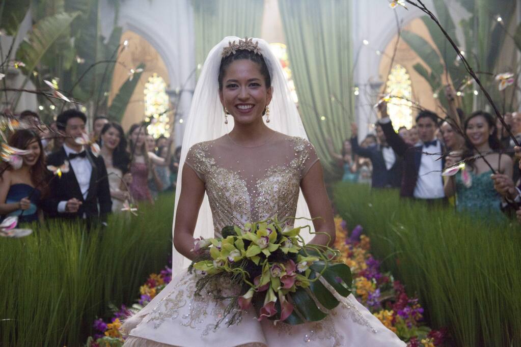 “Crazy Rich Asians”: When a native New Yorker meets her boyfriend’s wealthy family in Singapore, it’s not at all what she expected. Stream the 2018 romantic comedy on HBO Max. (Sanja Bucko/Warner Bros. Entertainment via AP)