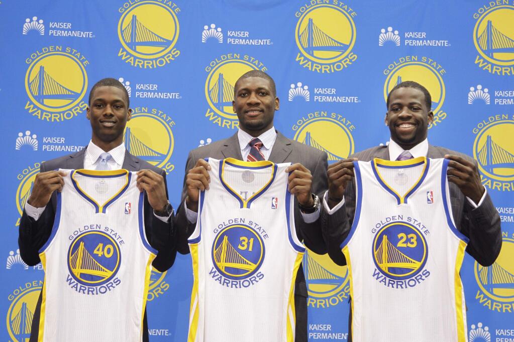 The Warriors came home with quite a haul from the 2012 NBA Draft: (from left) Harrison Barnes, Festus Ezeli and Draymond Green. (Paul Sakuma / Associated Press)