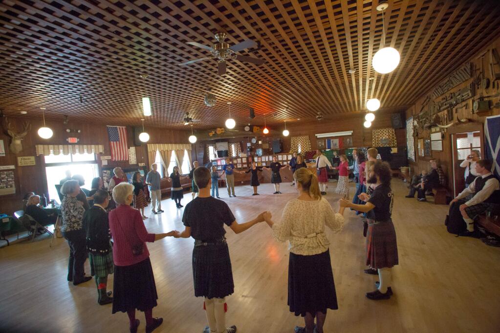 Guests take park in Scottish country dancing during a fundraiser for the Santa Rosa Scottish Dancers at Monroe Hall, in Santa Rosa, Calif. Saturday, March 25, 2017. (Jeremy Portje / For The Press Democrat)