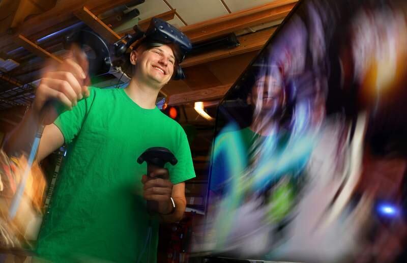 TO VIRTUAL INFINITY, AND BEYOND! - Aaron Kendall, CEO of Virtual Frontier, hires out virtual reality system for parties, company functions, weddings and proms. (Christopher Chung/ The Press Democrat)