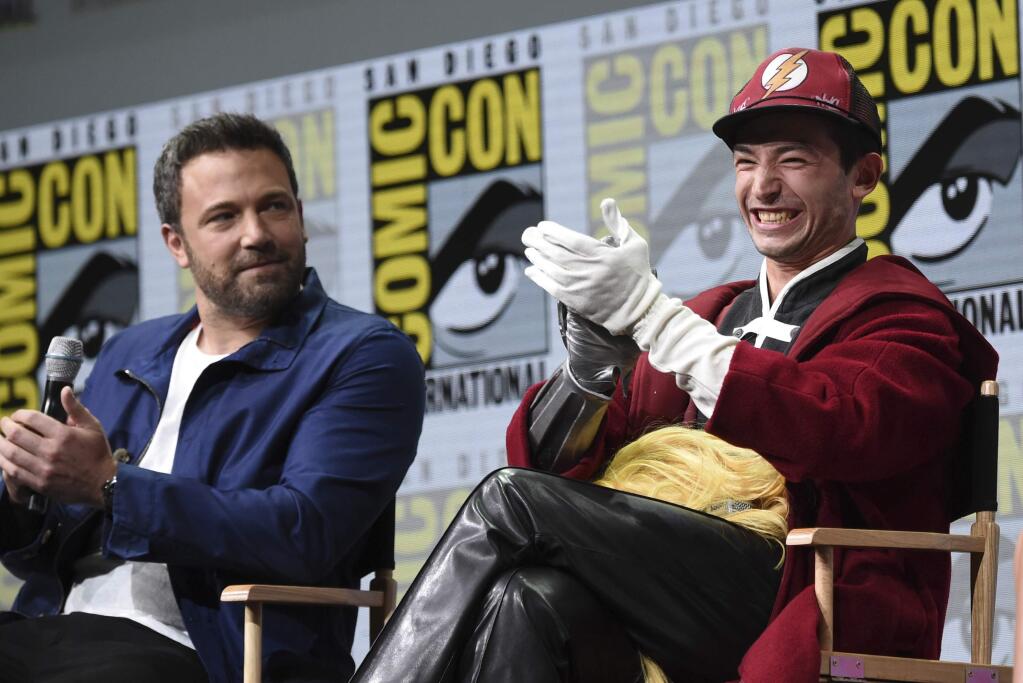 Ben Affleck, left, and Ezra Miller attend the Warner Bros. 'Justice League' panel on day three of Comic-Con International on Saturday, July 22, 2017, in San Diego. (Photo by Richard Shotwell/Invision/AP)
