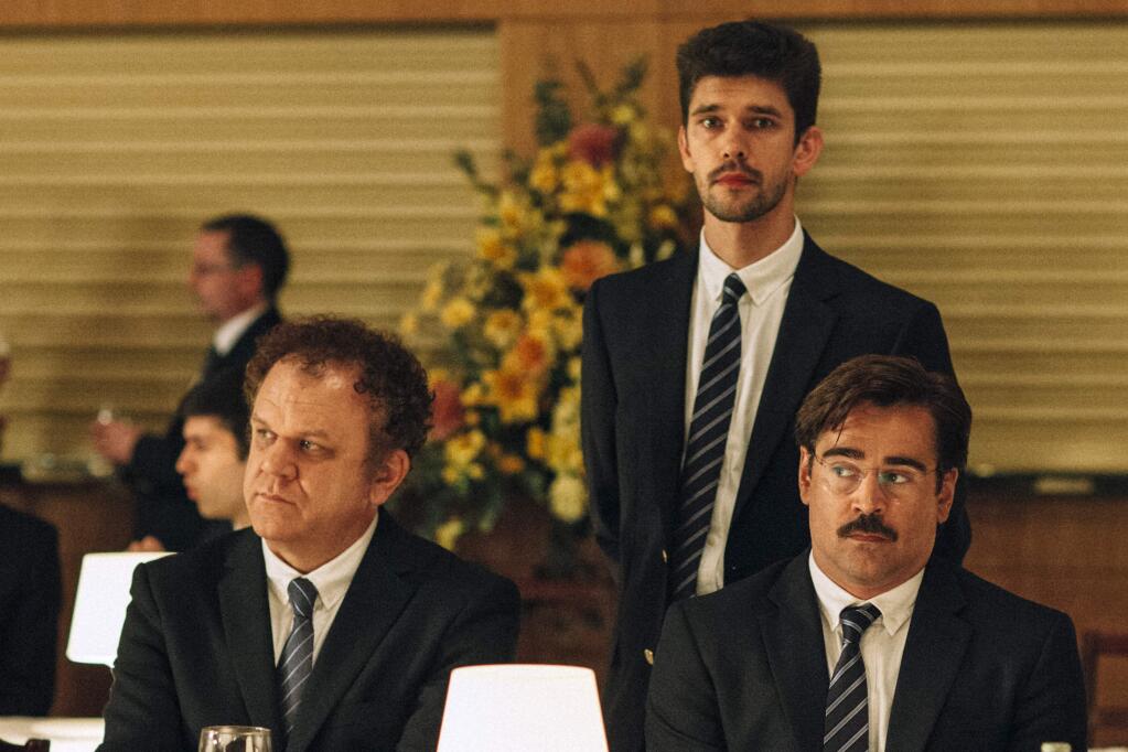 This image released by A24 Films shows, from left, John C. Reilly, Ben Whishaw and Colin Farrell in a scene from the film, 'The Lobster.' The movie opens Friday, May 13, 2016. (A24 Films via AP)