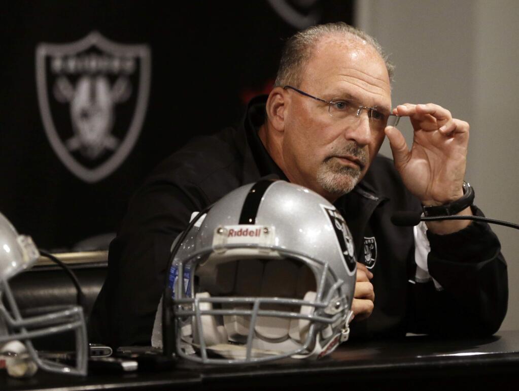 Oakland Raiders interim coach Tony Sparano answers questions from reporters during a news conference Tuesday, Sept. 30, 2014, in Alameda. The NFL football teamed Sparano as interim coach on Tuesday, a day after firing Dennis Allen as coach. (AP Photo/Ben Margot)