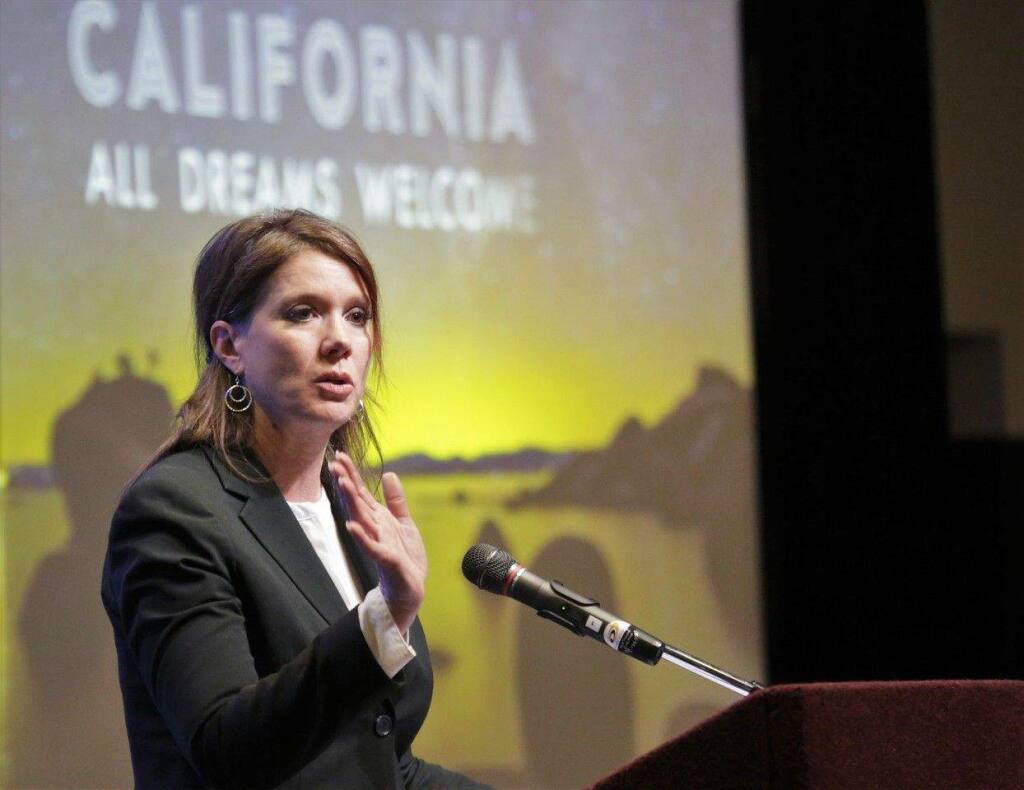 Visit California's Caroline Beteta explains the state has recorded seven straight years of growth in the travel sector, speaking at Sonoma County Tourism's annual breakfast meeting April 11, 2017, at Santa Rosa's Hyatt Vineyard Creek. (Will Bucquoy)