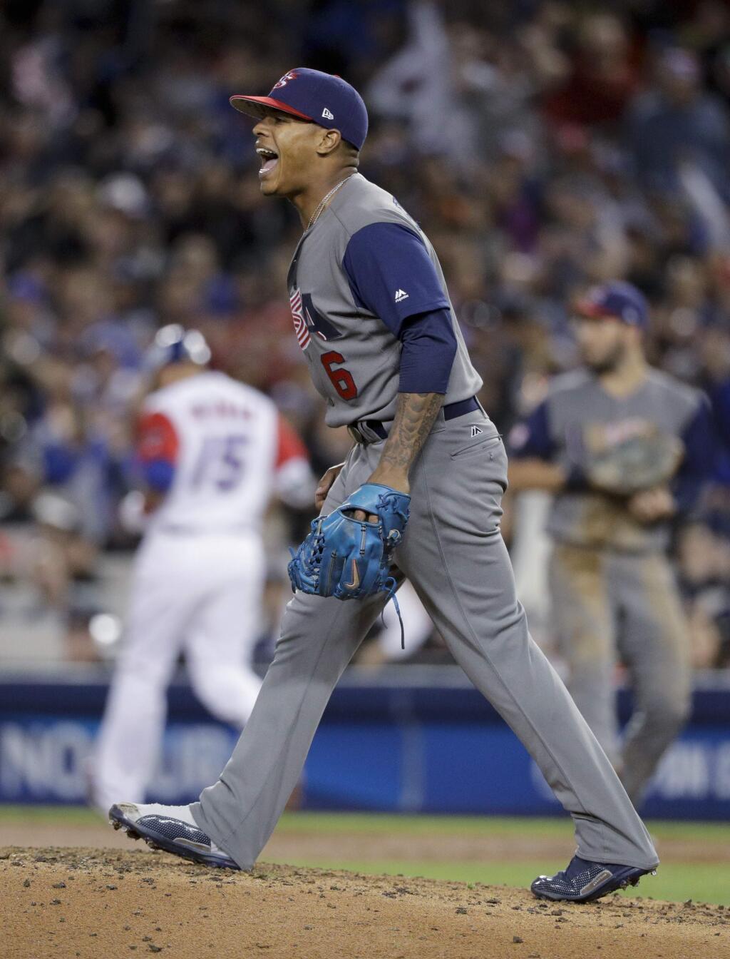 U.S. pitcher Marcus Stroman celebrates an out against Puerto Rico during the fifth inning of the final of the World Baseball Classic in Los Angeles, Wednesday, March 22, 2017. (AP Photo/Jae C. Hong)