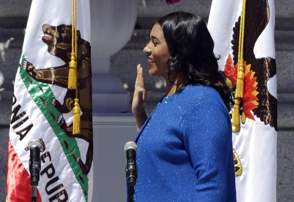 London Breed is sworn in as San Francisco's new mayor Wednesday, July 11, 2018, outside City Hall in San Francisco. The 43-year-old Breed becomes the city's first African American female mayor and she inherits a San Francisco battling homelessness, open drug use and unbearably high housing costs. (AP Photo/Marcio Jose Sanchez)