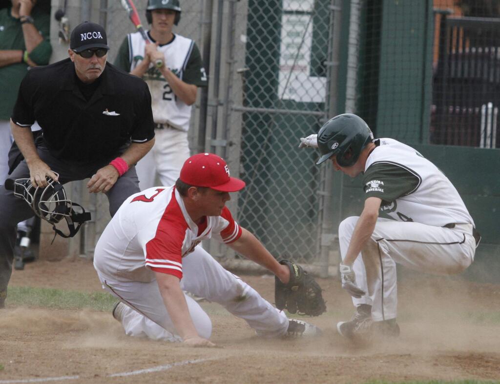 Bill Hoban/Index-TribuneSonoma's Japhy Koch is safe at home in a play during Tuesday's game against El Molino. The Dragons beat El Mo 11-1 in a game that was shortened because of the 10-run rule.