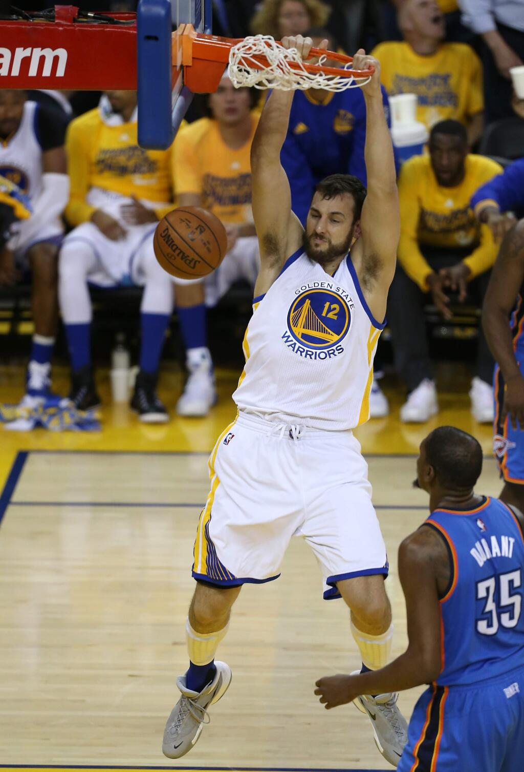 Golden State Warriors' Andrew Bogut throws down a dunk against the Oklahoma City Thunder, during their game in Oakland on Thursday, May 26, 2016. (Christopher Chung/ The Press Democrat)