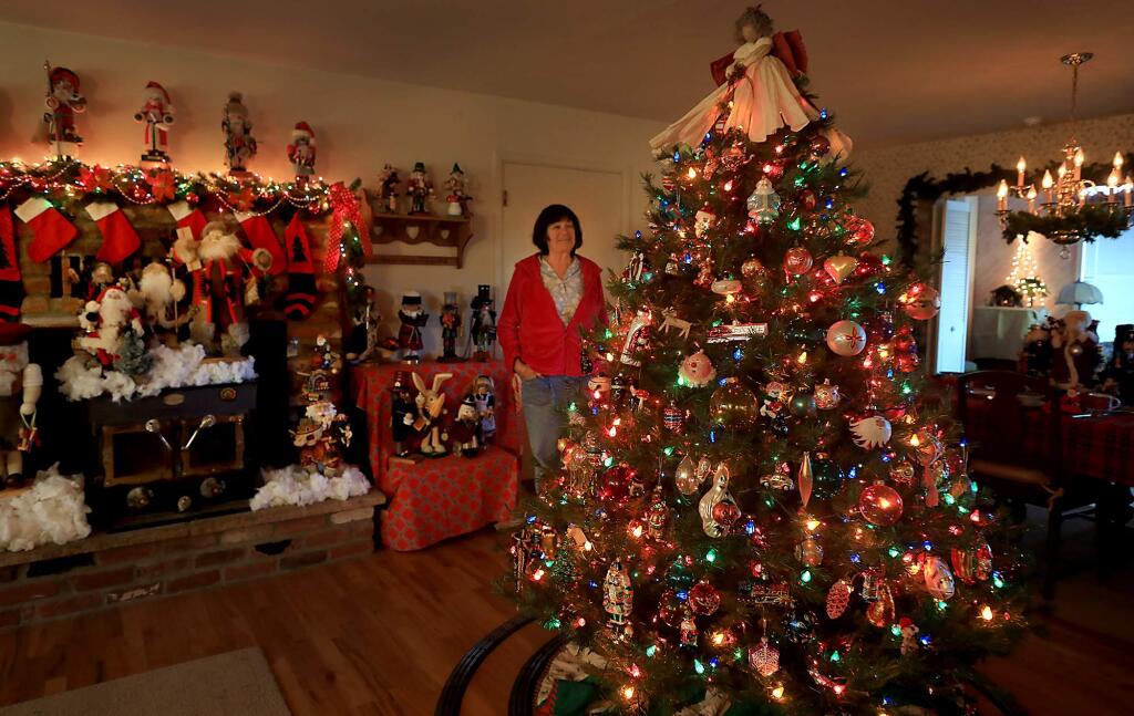 Nanette Owens has been collecting Christmas ornaments for 35 years, Thursday, Dec. 6, 2018 in Sebastopol. (Kent Porter / The Press Democrat) 2018