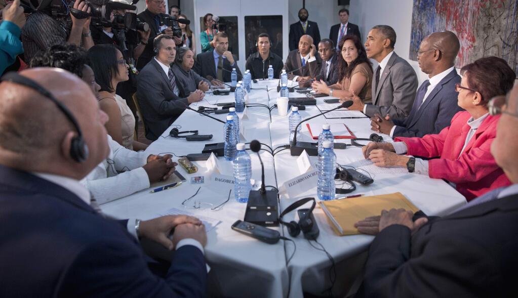 President Barack Obama meets with dissidents and other local Cubans at the U.S. Embassy, Tuesday, March 22, 2016, in Havana, Cuba. (AP Photo/Pablo Martinez Monsivais)