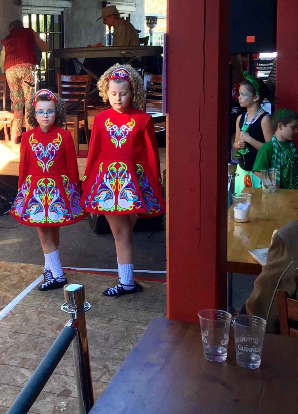 Lorna Sheridan/Index-TribuneIrish dancing at Murphy'sSonoma students who train at the Keenan Irish Dance School in Santa Rosa performed on St. Patricks's Day to a very enthusiastic and very green crowd at Murphy's Irish Pub. Prestwood fourth grader Dharma Niles and Presentation fifth grader Catey Keohane prepared to go onstage at Murphy's Irish Pub on St. Patrick's Day.