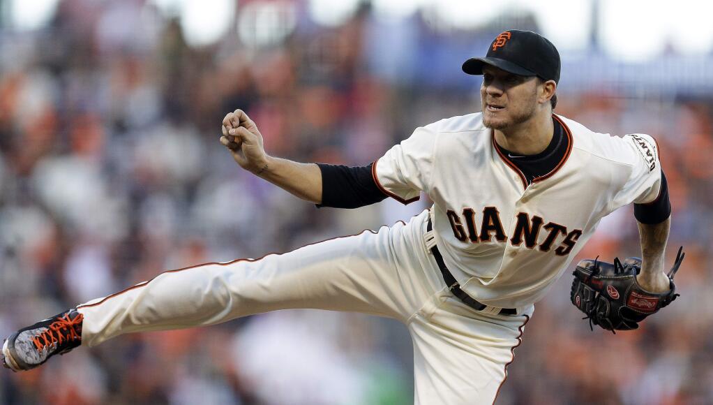 San Francisco Giants' Jake Peavy works against the Milwaukee Brewers in the second inning of a baseball game Saturday, Aug. 30, 2014, in San Francisco. (AP Photo/Ben Margot)