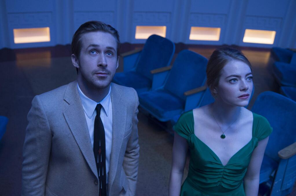 This image released by Lionsgate shows Ryan Gosling, left, and Emma Stone in a scene from, 'La La Land.' The film was nominated for a Golden Globe award for best motion picture musical or comedy on Monday, Dec. 12, 2016. The 74th Golden Globe Awards ceremony will be broadcast on Jan. 8, on NBC. (Dale Robinette/Lionsgate via AP)